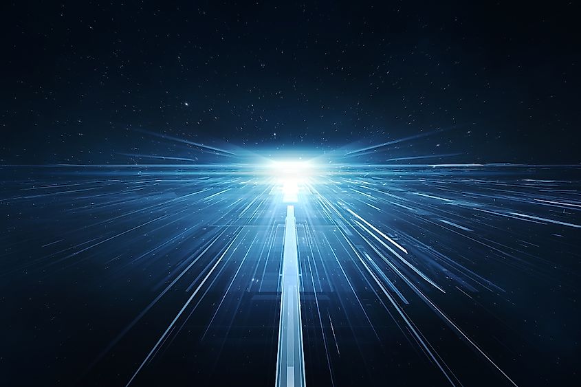 A beam of light traveling through deep space
