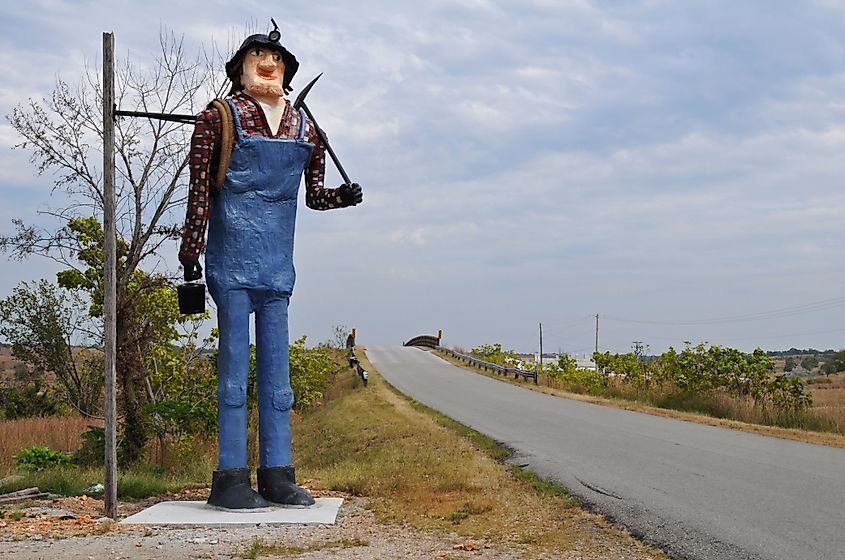 A sculpture of a miner stands along Route 66 in Galena, Kansas.