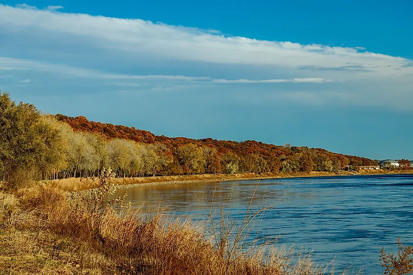 A beautiful shot of a Missouri river under a blue sky in late fall.