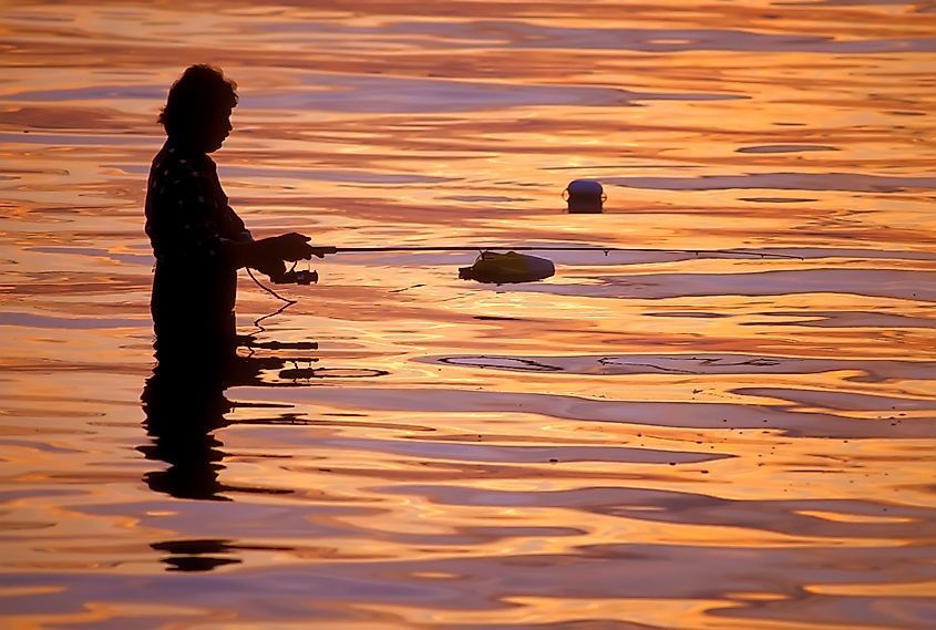 Fisherman at sunset on Lake Superior at Copper Harbor 