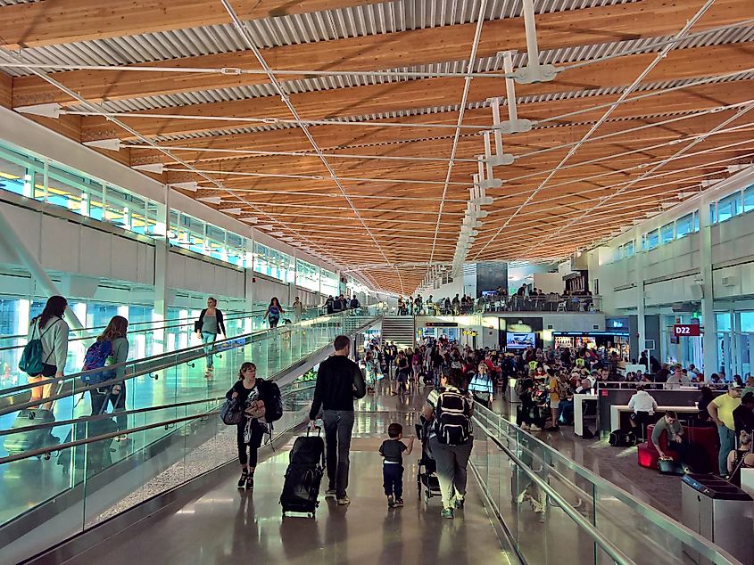 Passengers traverse the ramp in the bus gates facility at Seattle-Tacoma International Airport