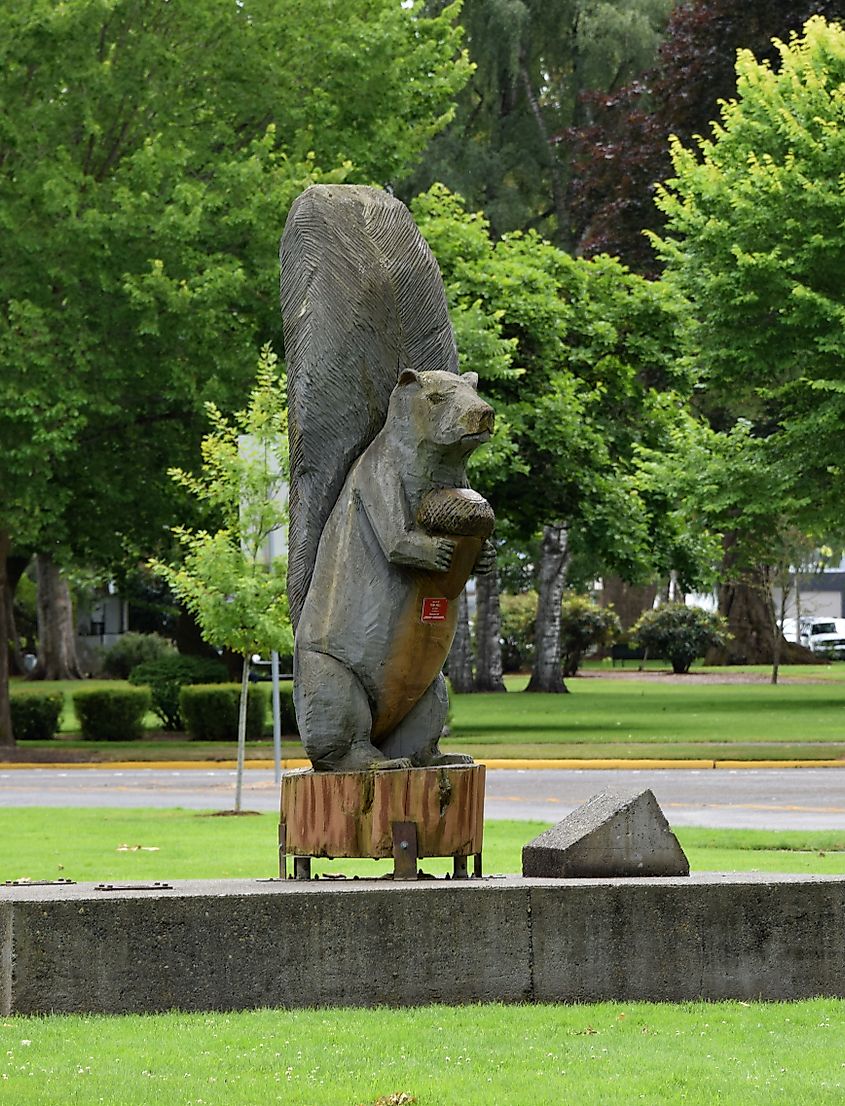 Squirrel with acorn sculpture dedicated to Amos Peters, builder of the Nutty Narrows Bridge.