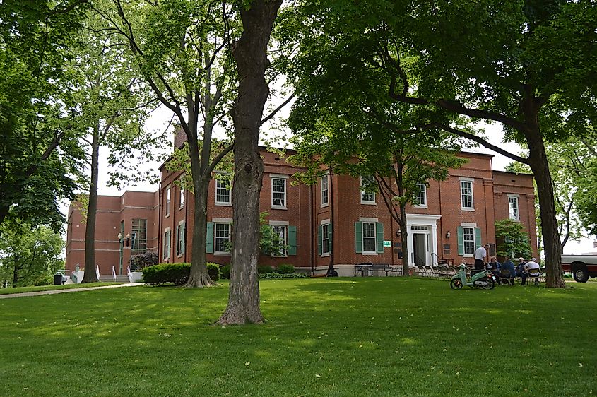 Western front of the Monroe County Courthouse, located on Courthouse Square in central Waterloo, Illinois, United States. Built in 1851 and repeatedly expanded, it is part of the Waterloo Historic District, a historic district that is listed on the National Register of Historic Places.