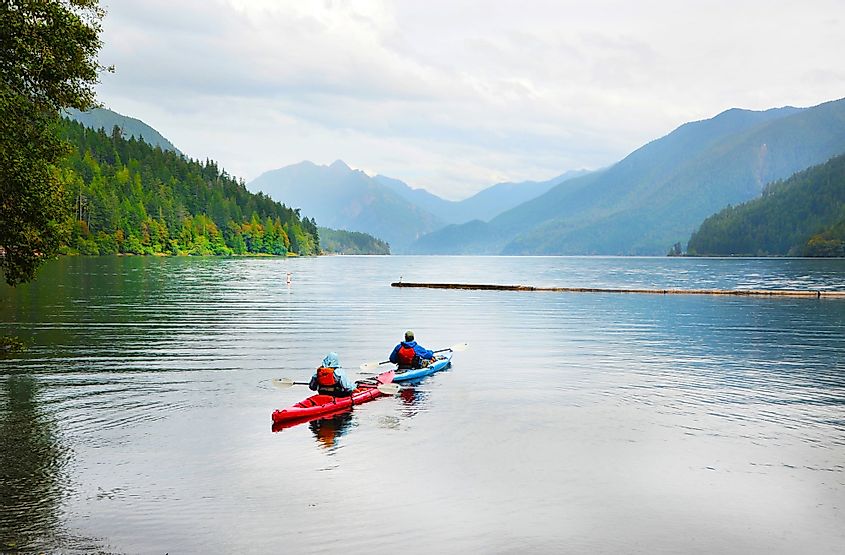 A couple kayaking on Crescent Lake in Olympic National Park, Washington