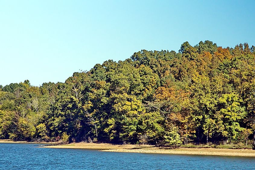 A lake lined with fall foliage in the Land Between the Lakes National Recreation Area.