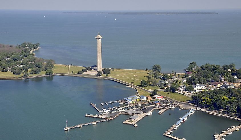 aerial view of Put in Bay's marina and Perry's Victory & International Peace Memorial, Kelley's Island in the far background; Put-in-Bay, South Bass island Ohio