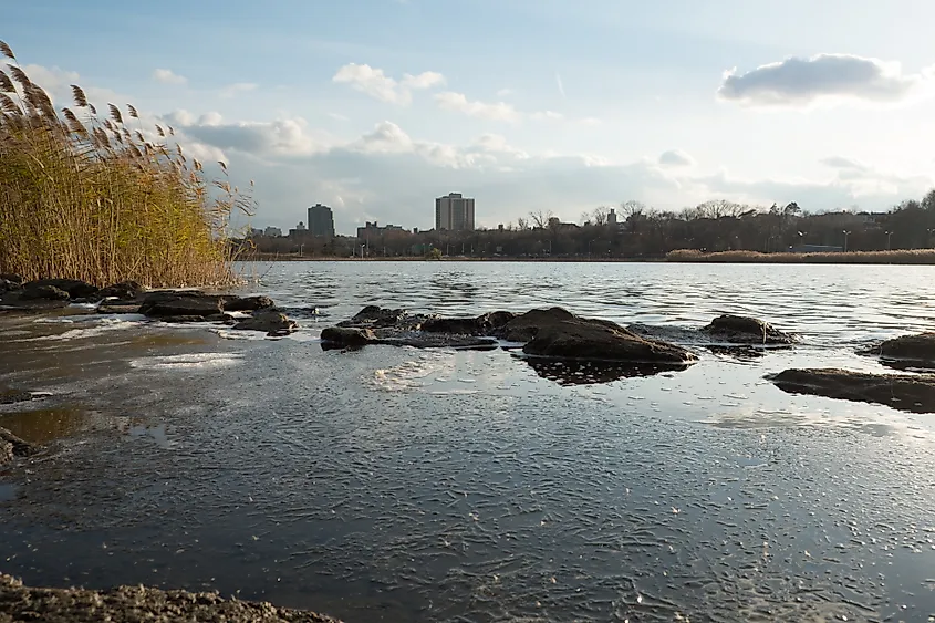 Calm waters of the Meadow Lake in Flushing Meadows Corona Park in Flushing, Queens, New York
