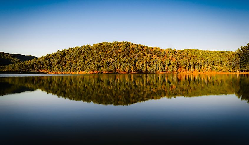 A mirrored reflection of a hill near Shenandoah National Park within Lake Arrowhead of Luray, Virginia.