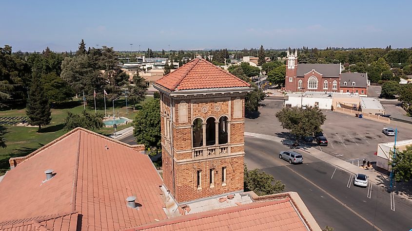 Historic church and downtown buildings in Kingsburg, California, lit by the afternoon sun