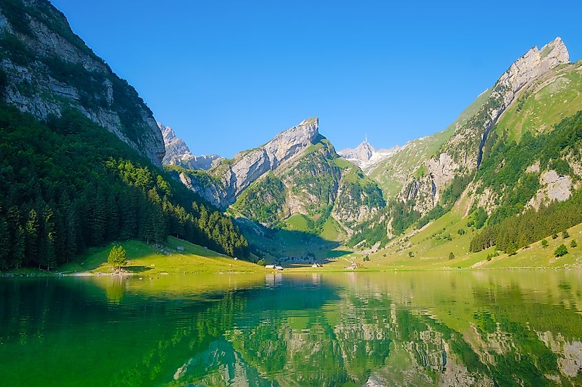 Seealpsee, Switzerland. Lake and reflections on the water surface. 