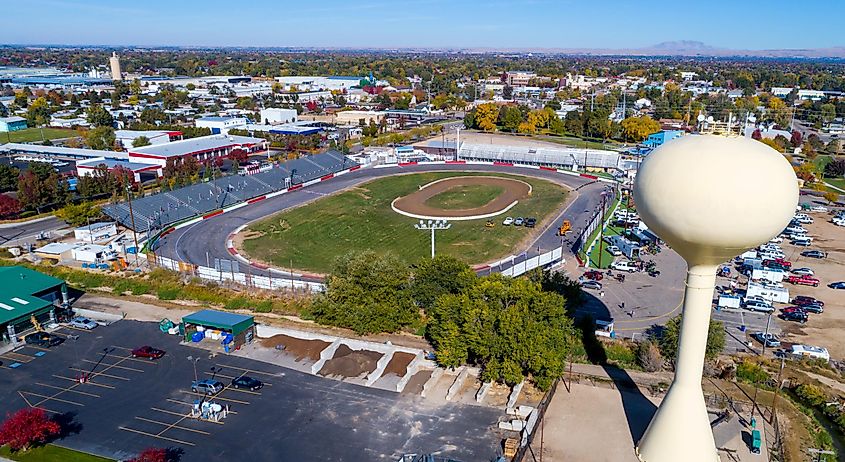 The little town of Meridian, Idaho, featuring a car race track and a water tower.