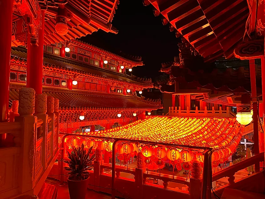 A Taoist temple bathed in the red light of hundreds of lanterns.