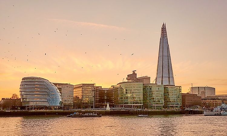 The Shard in London, with the wider city skyline of the United Kingdom in the background.