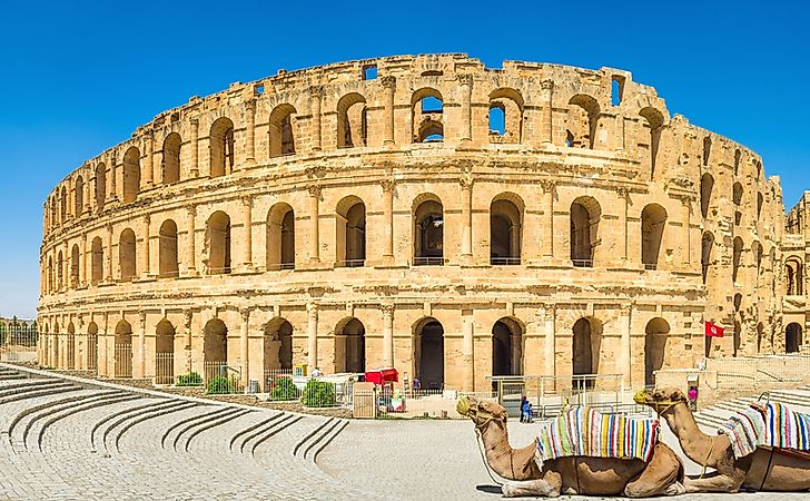 The ancient amphitheatre in El Djem with two camels on the foreground, Tunisia. 