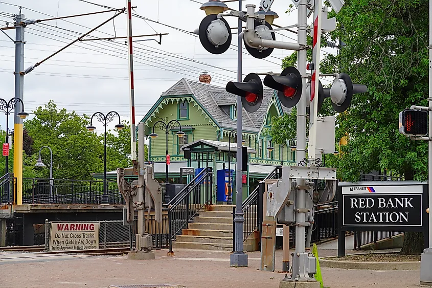 View of the historic Red Bank Train Station, a landmark Victorian NJ Transit commuter railroad station in Red Bank, Monmouth County, New Jersey. (2020). EQRoy - Shutterstock
