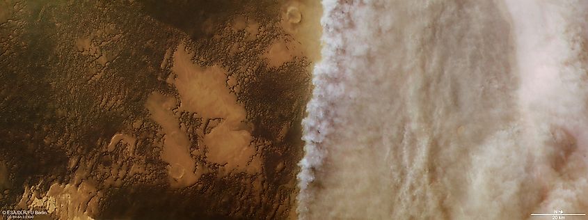 Dust clouds rise near Mars' north polar ice cap in an image from ESA's Mars Express.