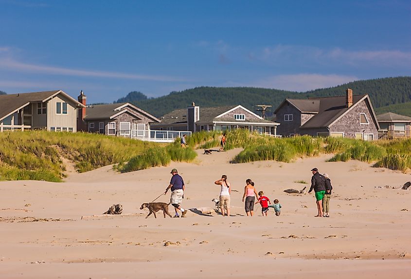 A family on a beach in Manzanita, Oregon