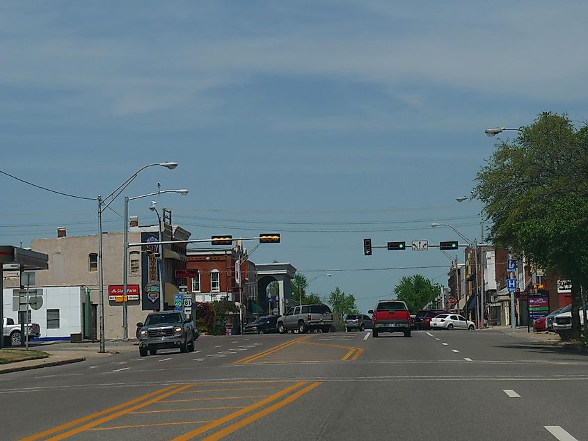 Main street of El Reno, Oklahoma with cars traveling on a sunny day