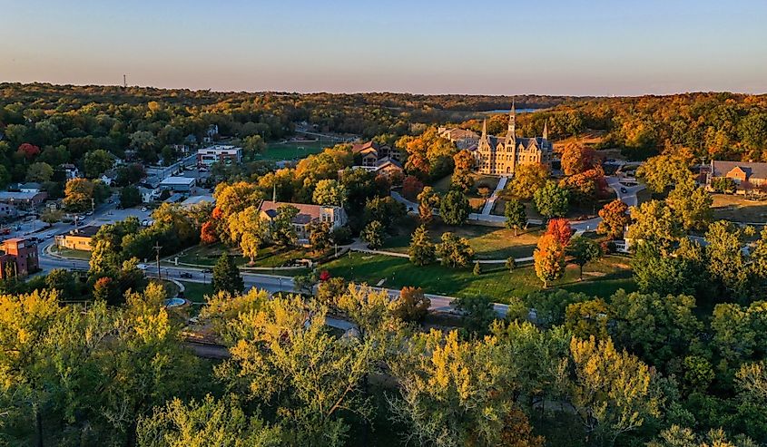 Aerial view of Parkville, Missouri, featuring Park University and English Landing Park during fall.