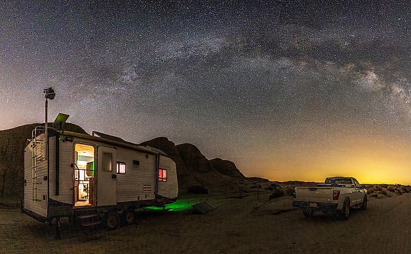 Travel trailer and pickup truck in a remote location in Anza-Borrego Desert State Park.