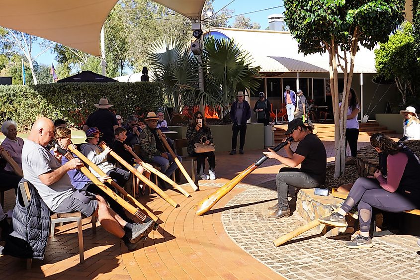 People receiving Didgeridoo Playing Lessons in Yulara, Northern Territory, Australia