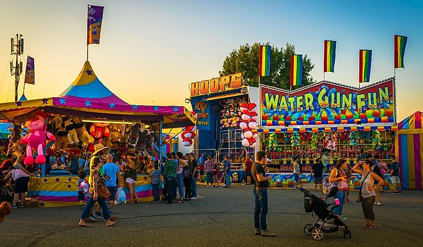 Attendees of the Big E enjoy carnival games in West Springfield, Massachusetts