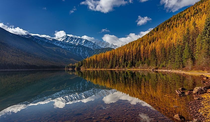 Great Northern Mountain reflects into Stanton Lake in autumn in the Flathead National Forest