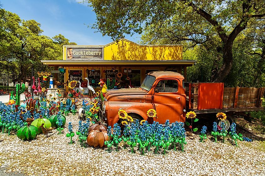 Colorful Cackleberry shop with artwork on display in the small Texas Hill Country town of Wimberley