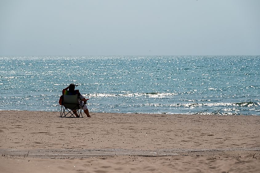 A silhouette of a woman on a beach at Two Rivers, Wisconsin