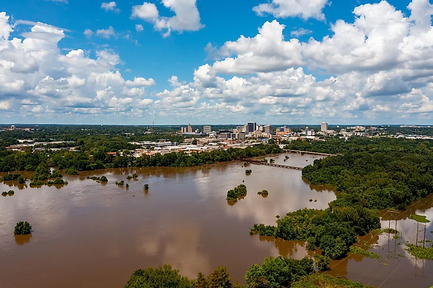 Jackson, Mississippi, skyline with flooding Pearl River in the foreground