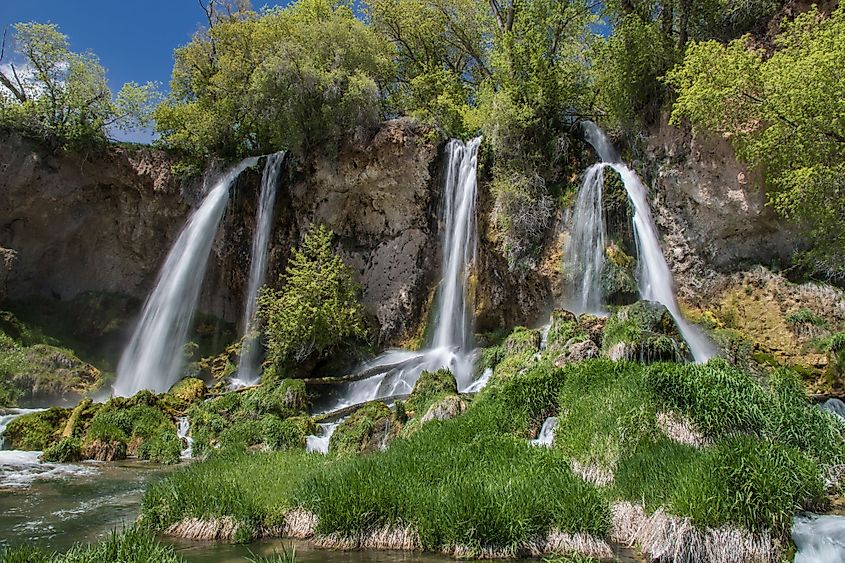 A close view of the triple falls at Rifle Falls in the lush springtime in Rifle Falls State park, Colorado