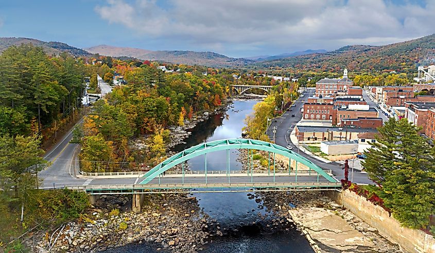 Aerial view of bridges and reservoir in Rumford Maine during the fall season.