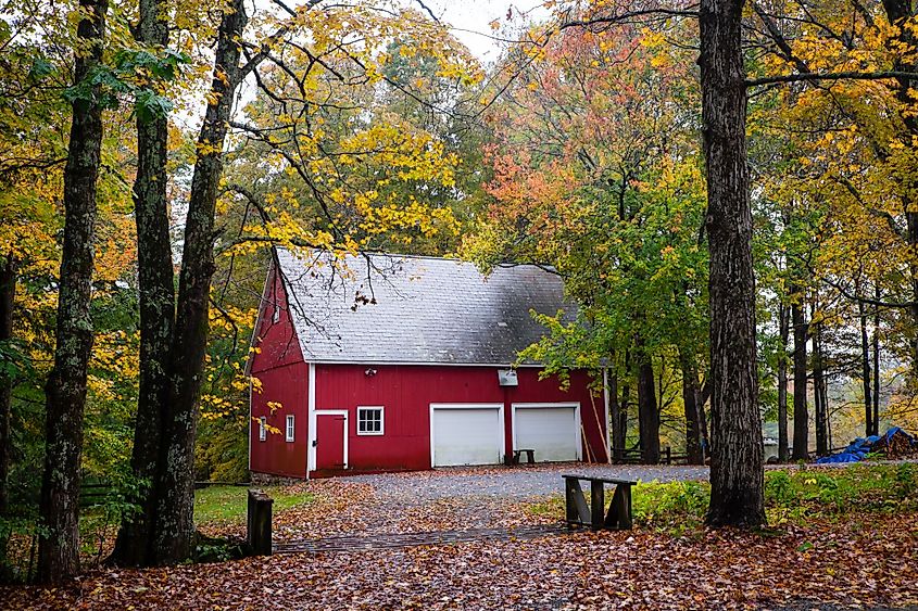 A red house surrounded by fall colors near Manchester, Vermont.