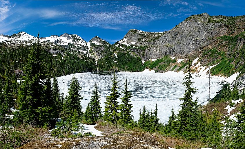 Frozen Thorton Lake and Trappers Peak, North Cascades National Park, Washington.