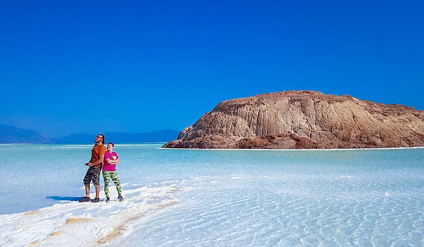 Aerial view of tourists on the blue salty Lake Assal