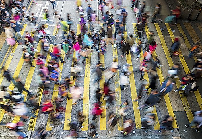 Busy pedestrian crosswalk from above in Hong Kong