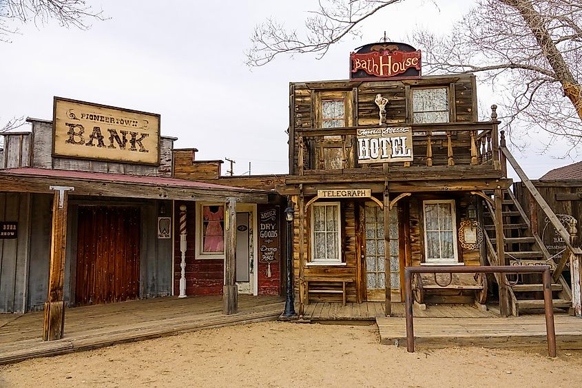 Scenic close-up of two wooden buildings in the old town of Pioneertown, California.