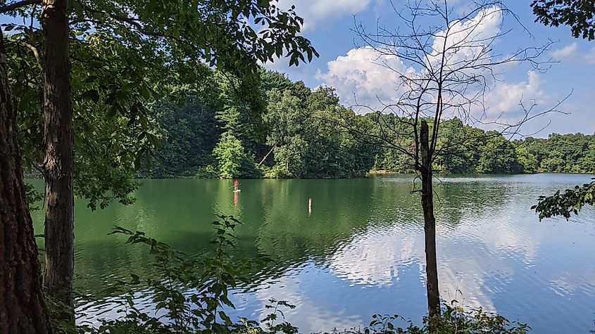 Photo Credit: WikimediaCommons. Wolf Run Lake, a reservoir in Wolf Run State Park, Ohio, USA. Looking North from a campsite on the Eastern loop of the Wolf Run State Park Campground.