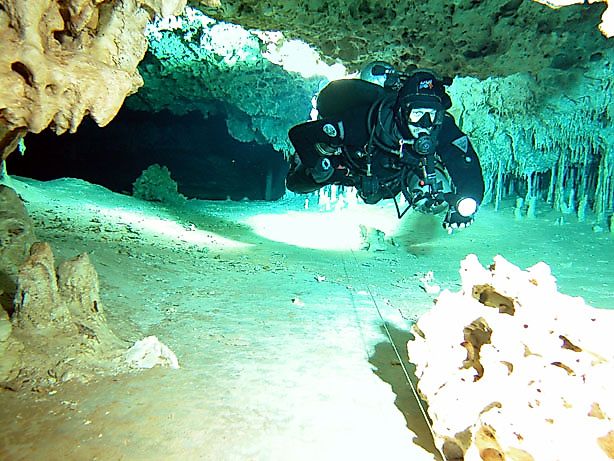 Photo of a diver in the Sistema Ox Bel Ha, via