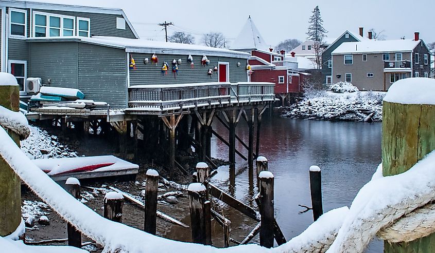 Home pier in Kennebunkport Harbor, Maine during a snowstorm