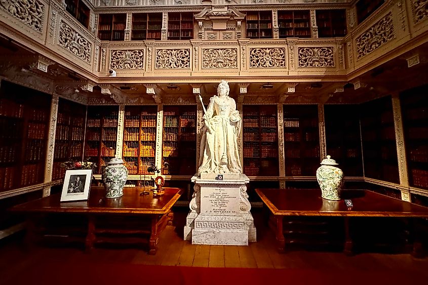 Queen Anne in the palace library. Image credit: Bryan Dearsley