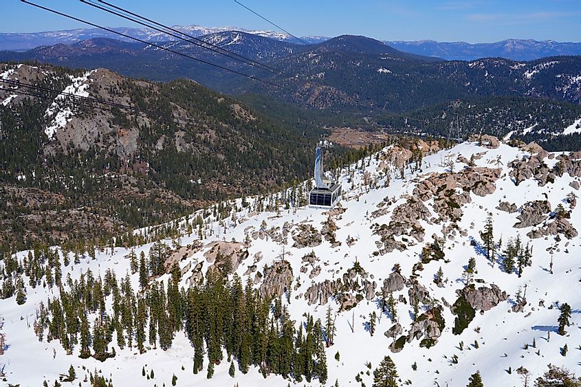 View of the aerial tram gondola going to high camp above Palisades Tahoe in California