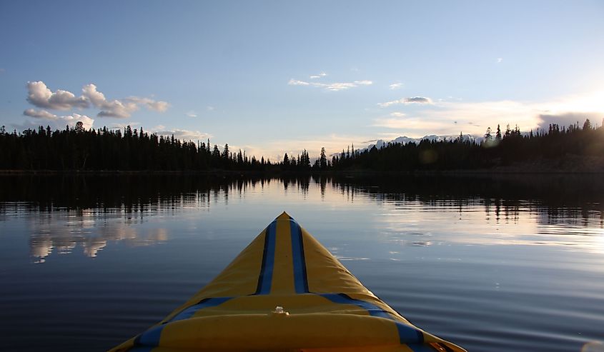 The bow of a kayak on East Tensleep lake in the Bighorn Mountains of Wyoming