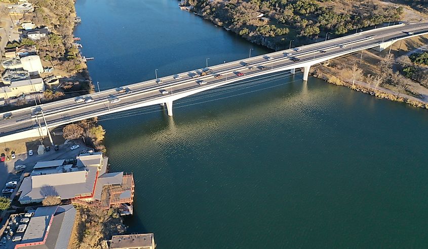 An aerial shot of the lake marble falls reservoir during the day in Texas