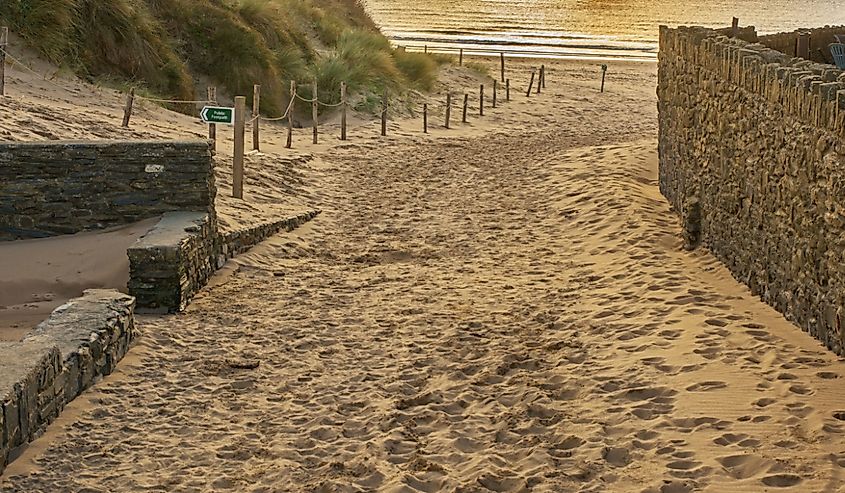 Sandy beach at Croyde Bay near Barnstaple in North Devon, England. Path leading to beach.