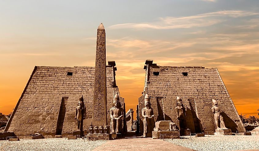 Entrance to Luxor Temple at sunset, a large Ancient Egyptian temple complex located on the east bank of the Nile River in the city today known as Luxor (Thebes). Was consecrated to the god Amon-Ra