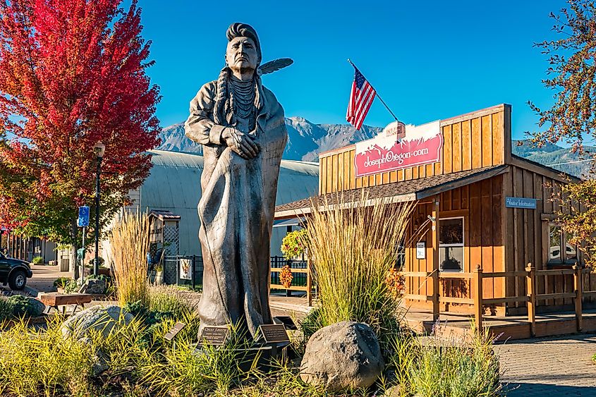 Chief Joseph sculpture by Georgia Bunn and the chamber of commerce in downtown Joseph, Oregon, USA on a sunny morning. Credit: benedek https://www.istockphoto.com/portfolio/benedek?mediatype=photography