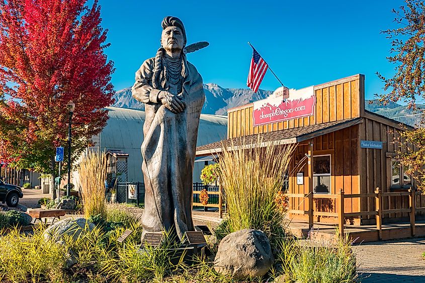 Chief Joseph sculpture by Georgia Bunn and the chamber of commerce in downtown Joseph, Oregon, USA on a sunny morning. Credit: benedek https://www.istockphoto.com/portfolio/benedek?mediatype=photography