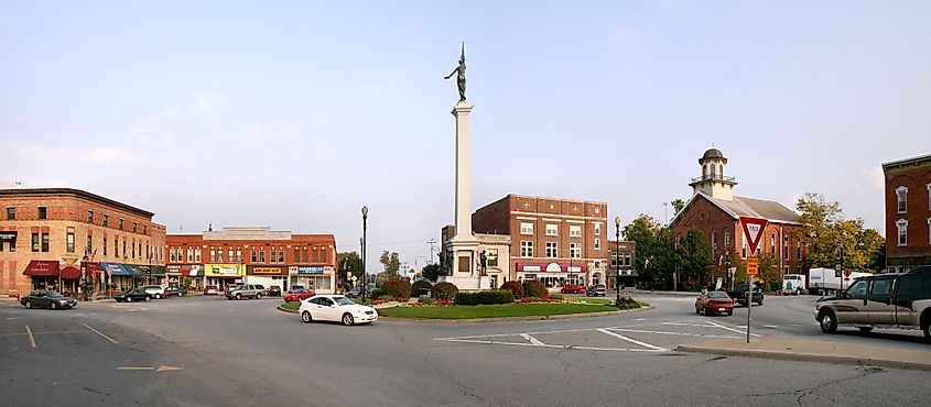 Downtown Angola's traffic circle, "the Mound", with a Civil War monument. The building with the cupola is the county courthouse.