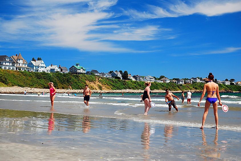  People enjoy playing summer games on Long Sands Beach in York, Maine.